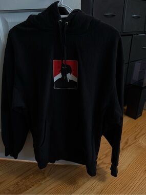 Supreme Marlboro Black Hoodie with Red & White Graphic